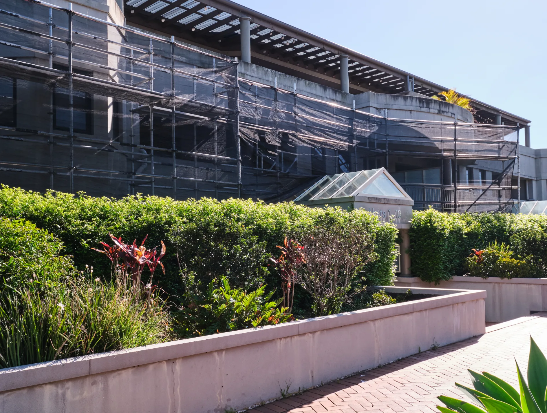 Scaffolding erected around a commercial building in Sydney for exterior painting works